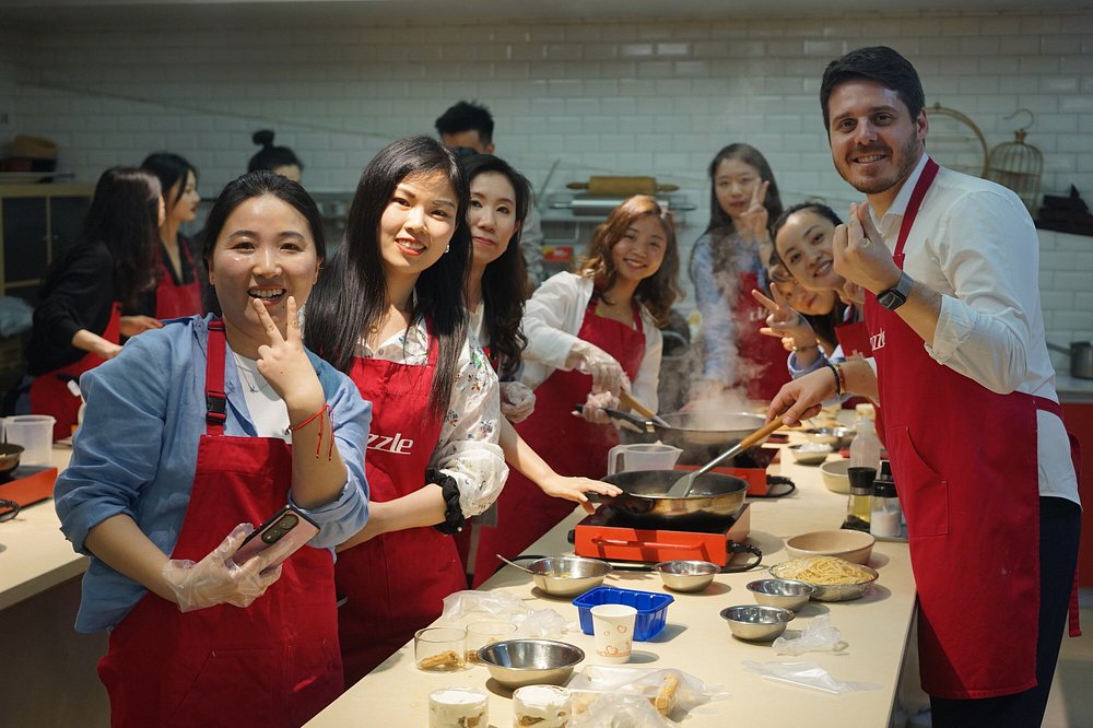 Guests cooking Chinese dim sum at Tascovery Gourmet School